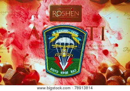 Illustative editorial.Ukrainian military paratroopers chevron.With logo Roshen Inc. Trademark Roshen is property of ukrainian president Poroshenko.At December 25,2014 in Kiev, Ukraine 