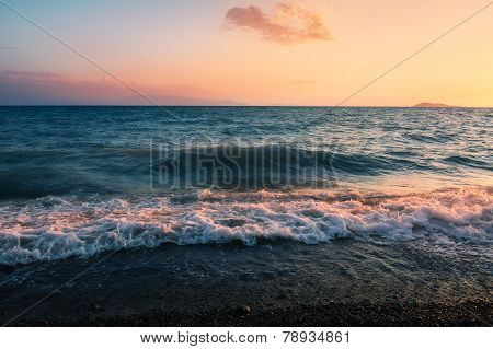 Sunset over lake alakol with clouds. Kazakhstan