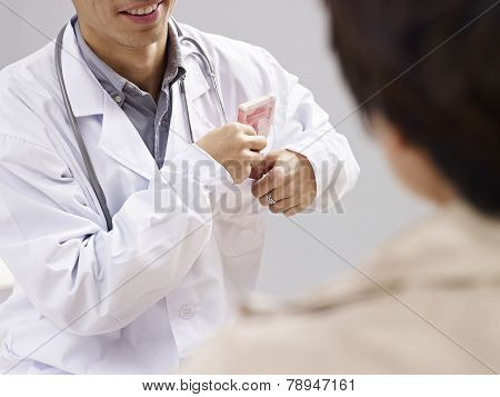 Doctor Taking Kickbacks