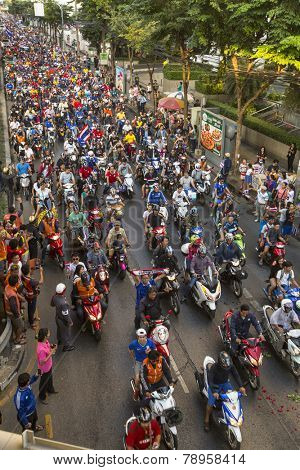BANGKOK, THAILAND - DEC 5, 2014: Motorcycle traffic jam in city centre during celebrate football fans winning AFF Suzuki Cup 2014. Goals gave them a dramatic 4-3 aggregate victory over Malaysia. 