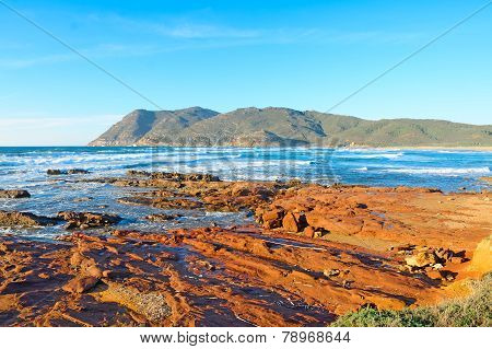 Red Rocks By The Shore In Porto Ferro