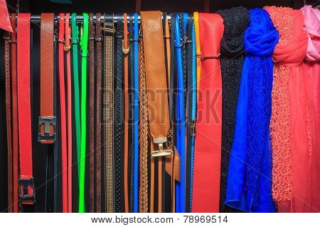 Collection of Colorful  Belts on Rack