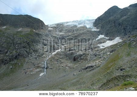 Rocks And Glacier In Alps In Switzerland