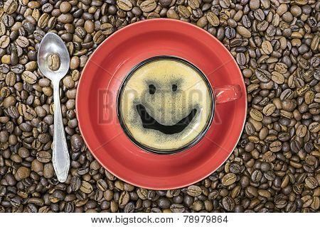Coffee Cup with a picture on the foam and spoon