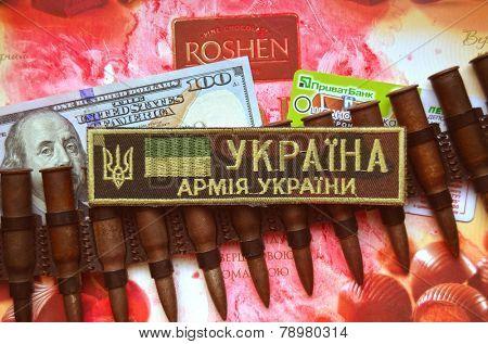 Kiev,Ukraine.Dec 20.Illustrative editorial. Chevron of Ukrainian Army.With logo Roshen Inc. Trademark Roshen is property of ukrainian president Poroshenko.At December 20,2014 in Kiev, Ukraine 
