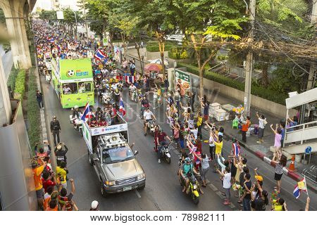 BANGKOK, THAILAND - DEC 5, 2014: Motorcycle traffic jam in city centre during celebrate football fans winning AFF Suzuki Cup 2014. Goals gave them a dramatic 4-3 aggregate victory over Malaysia. 