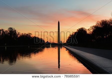Washington D.C. - Sunrise at Lincoln Memorial with silhouettes of Capitol Building and Washington Monument 
