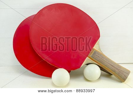 Two Table Tennis Rackets And Balls