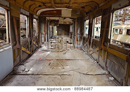 Abandoned train carriage with interior falling apart