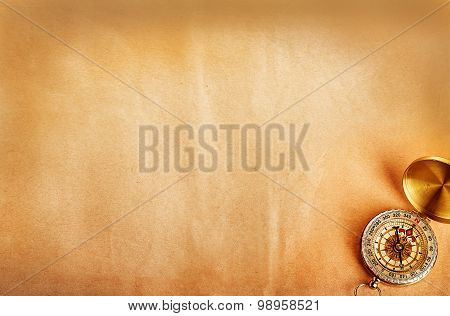 Compass On Old Paper As A Background