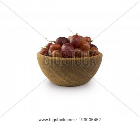 Gooseberries fruits isolated on white background. Gooseberries in a bowl with copy space for text. Ripe gooseberry close-up. Background berry. Sweet and juicy berry.
