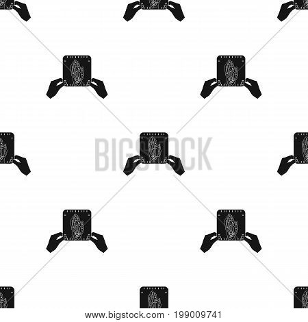 X-ray picture of the hand of a person in the hands of a radiologist. Medicine single icon in black style vector symbol stock illustration .