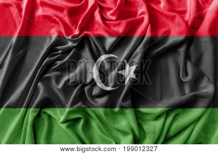 Ruffled waving Libya flag national flag close