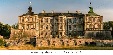 Medieval Pidhirtsi Castle in sunset summer light, Pidhirtsi village, Lviv region, Ukraine≠
