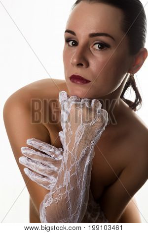 Nudel elegant girl with white lace gloves. Vintage style.