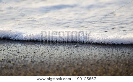 Wave On A Sand Beach