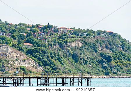 The Black Sea Shore, Green Hills With Houses, Blue Clouds Sky. City Balchik Coast, Blue Sea Water