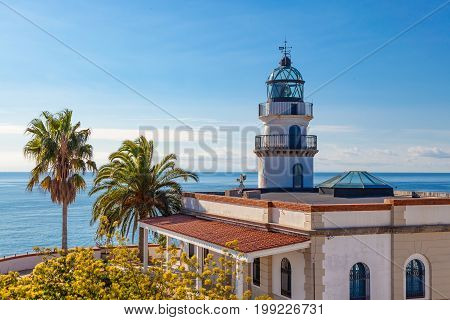 The famous lighthouse near Calella Costa Brava Spain overlooking the blue Mediterranean Sea.