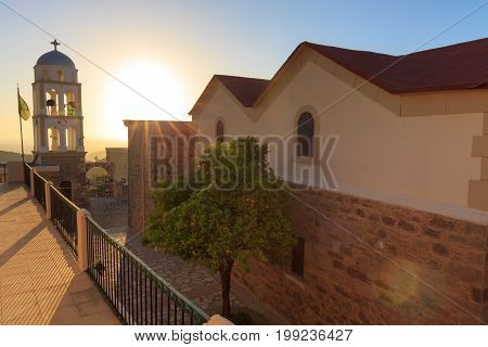 Belfry tower of church in Asfendiou village in Kos island Greece.
