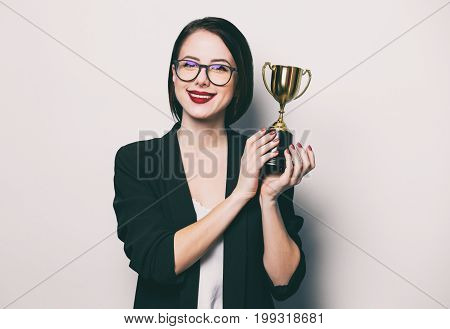 Young Smiling Woman With Cup Trophy