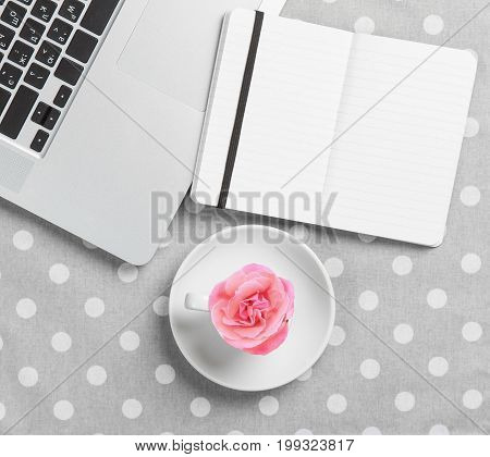 Cup And Notebook Near Laptop Comuter