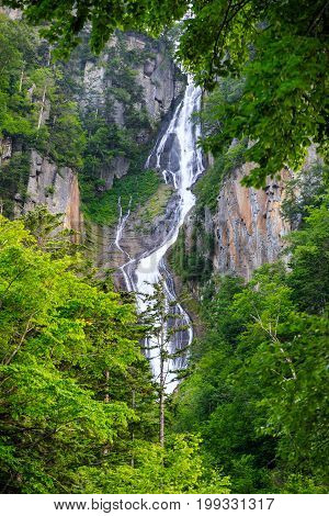 Waterfall In Rainforest Mountain In Hokkaido, Japan
