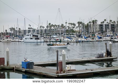 Recreational and fishing boats at the dock in Oxnard marina Ventura county Southern California Pacific coast; copy space