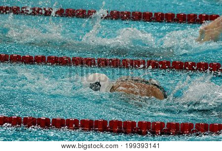 Hong Kong China - Oct 30 2016. Competitive swimmer Katinka HOSSZU (HUN) swimming in the Women's Butterfly 50m Preliminary Heat. FINA Swimming World Cup Victoria Park Swimming Pool.