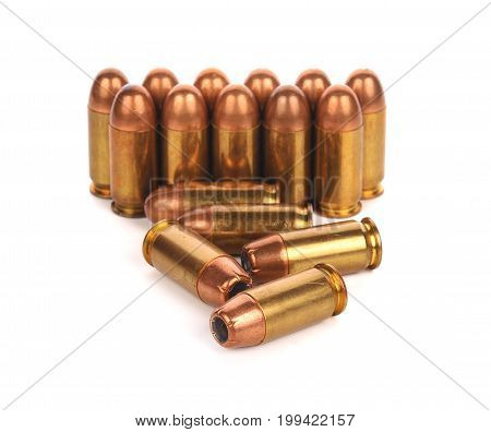 cartridges of .45 inch or 11mm pistols ammo bullets on white background