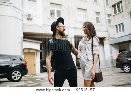 Man And Woman Or Young Couple Making A Trip As Tourists In City.