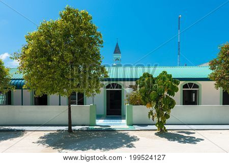 MAAFUSHI MALDIVES - MARCH 02 2016: Horizontal picture of Masjidhul Faarooq Mosque in Maafushi in Maldives.
