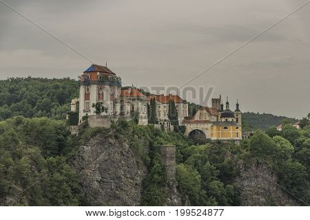 Vranov nad Dyji town with castle in cloudy summer day
