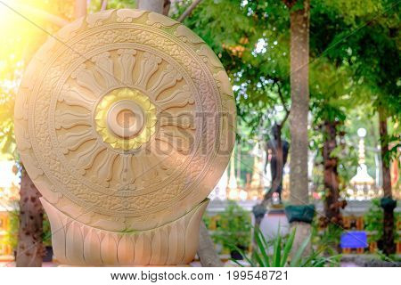 Vintage Image Style, The Wheel Of Dharma Of Temple Garden With Sunlight  In Bangkok, Thailand