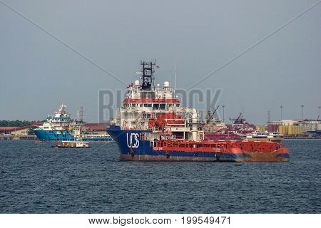Labuan,Malaysia-July 20,2017:Platform supply vessels in Labuan,Malaysia.Its often abbreviated as PSV,is a ship specially designed to supply offshore oil & gas platforms. These ships range from 50 to 100 meters in length & accomplish a variety of tasks.
