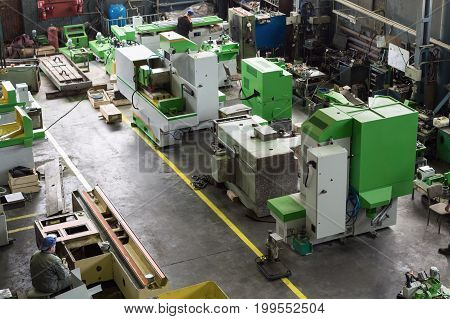 Assembly shop of the factory for the production of grinding machines. View from the top point.