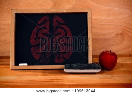 Illustration image of human brain against blackboard with duster and apple