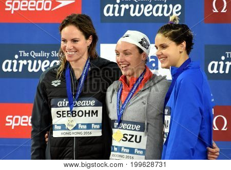 Hong Kong China - Oct 30 2016. SEEBOHM Emily (AUS) Katinka HOSSZU (HUN) and ZEVINA Daryna (UKR) at the Victory Ceremony of the Women's Backstroke 100m. FINA Swimming World Cup.