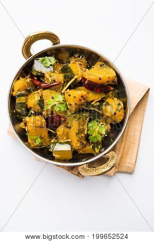 Popular indian main course vegetable Pumpkin dry curry or kaddooor kaddu ki sabzi in hindi, lal bhopla chi bhaji in marathi, selective focus