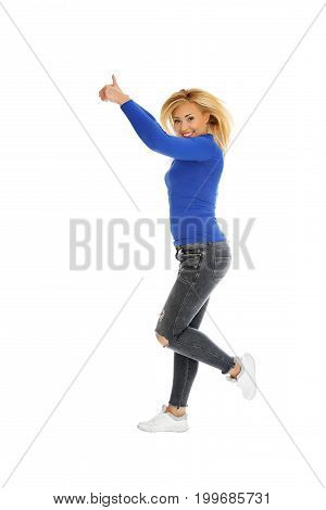 Young happy woman is jumping. Freedom and joyful.