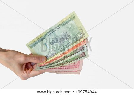 Woman Holding Nepal Rupees Notes In Her Hand