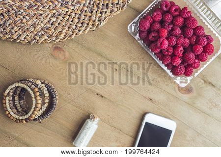 Summer Holiday, Vacation, Relaxation Concept. Raspberries, Straw Hat, Smartphone, Sunglasses From Ab