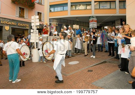 People Performing Gugge Music At The Carnival Of Lugano