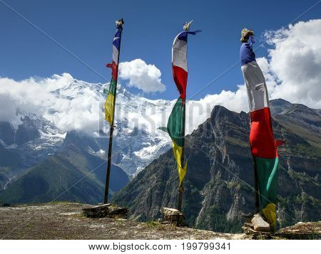 Prayer flags and Annapurna from Ghyaru village, Nepal