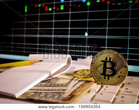 Golden bitcoin with banknote and stock market grap conceptual for crypto currency background.