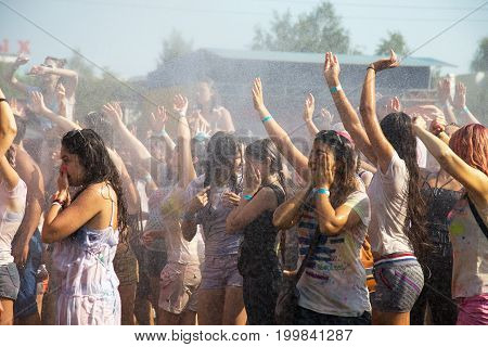 Odessa, Ukraine - August 5, 2017: Water Festival. Party Wet. Hands And Happy People Crowd Partying U