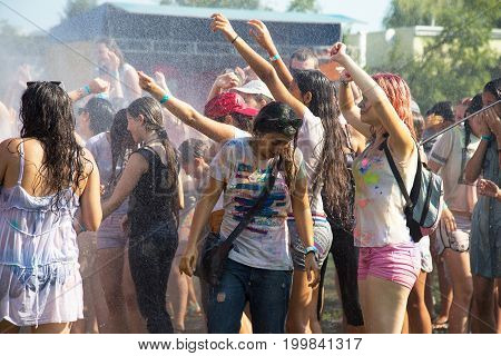 Odessa, Ukraine - August 5, 2017: Water Festival. Party Wet. Hands And Happy People Crowd Partying U