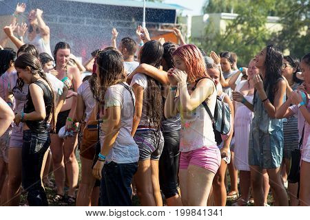 Odessa, Ukraine - August 5, 2017: Water Festival. Party Wet. Hands And Happy People Crowd Partying U