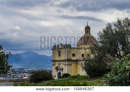 Baroque church the city of milazzo in the environs of its port and the landscape of the Sicilian territory with its mountains