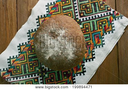 Russian traditional round bread - karavai ,close up traditional meal