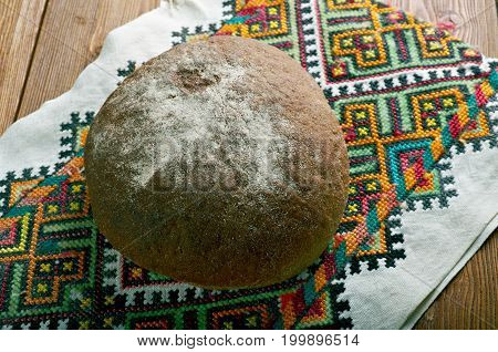 Russian traditional round bread - karavai close up  traditional meal